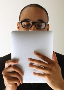 Man looking at tablet computer