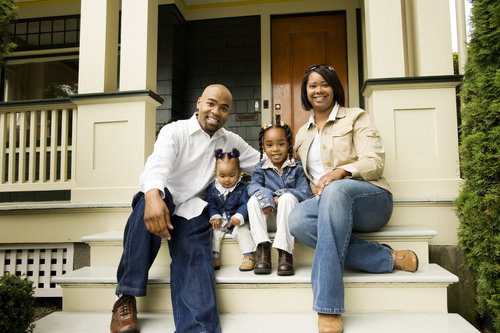 family-front-steps-house-porch-home-buyers-sellers