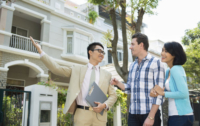 real-estate-agents-couple-showing-homes