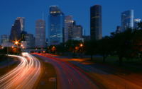 Houston skyline real estate summer activity slowing